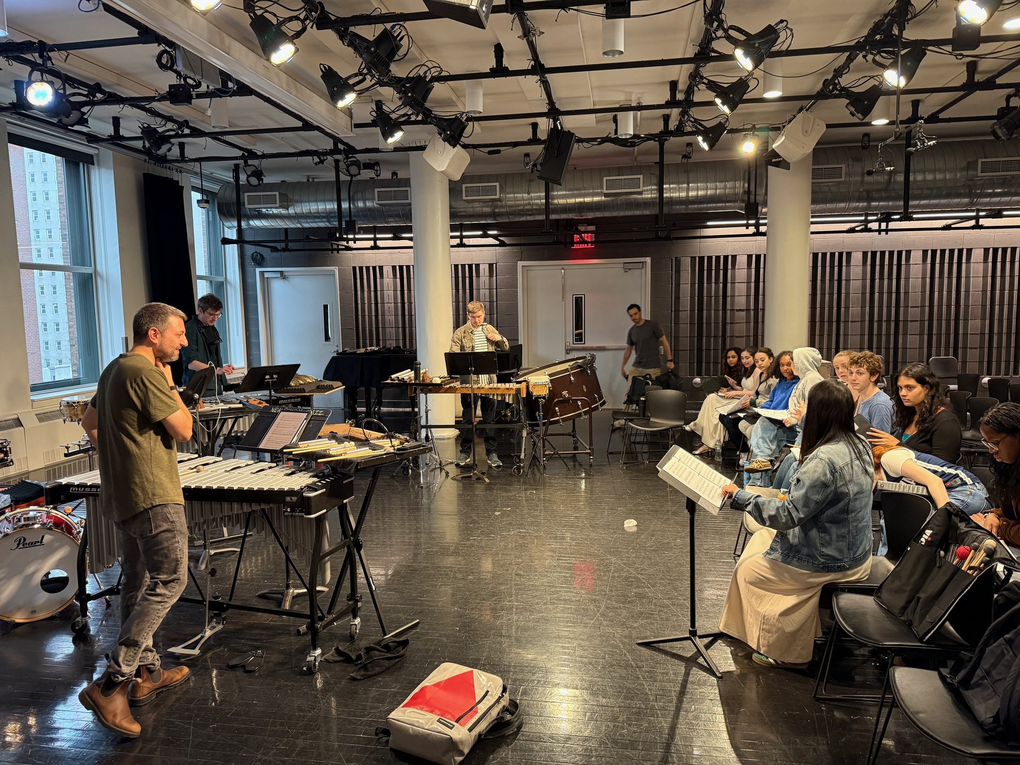 Christopher Cerrone in rehearsal for The Only Way Is Through with Sandbox Percussion and members of the Young People's Chorus of New York City